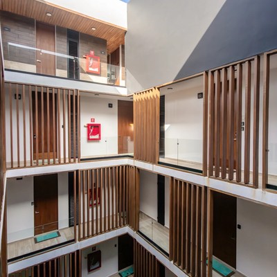 Image of a Modern Architecture, featuring Open-Air Atrium and Multi-Level Design.