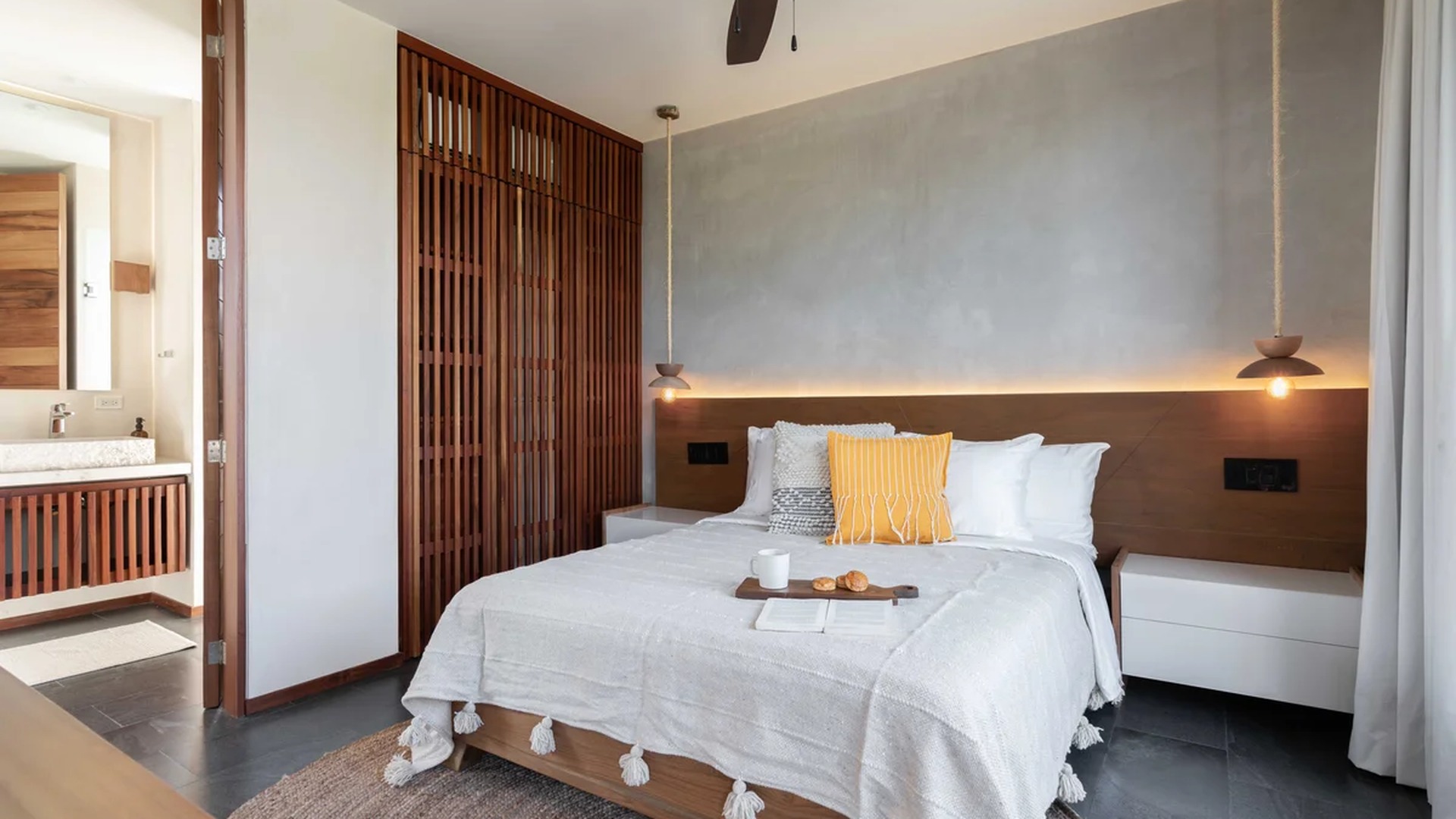 Image of a Primary Bedroom, featuring En-suite Bathroom and Wood Slat Closet.