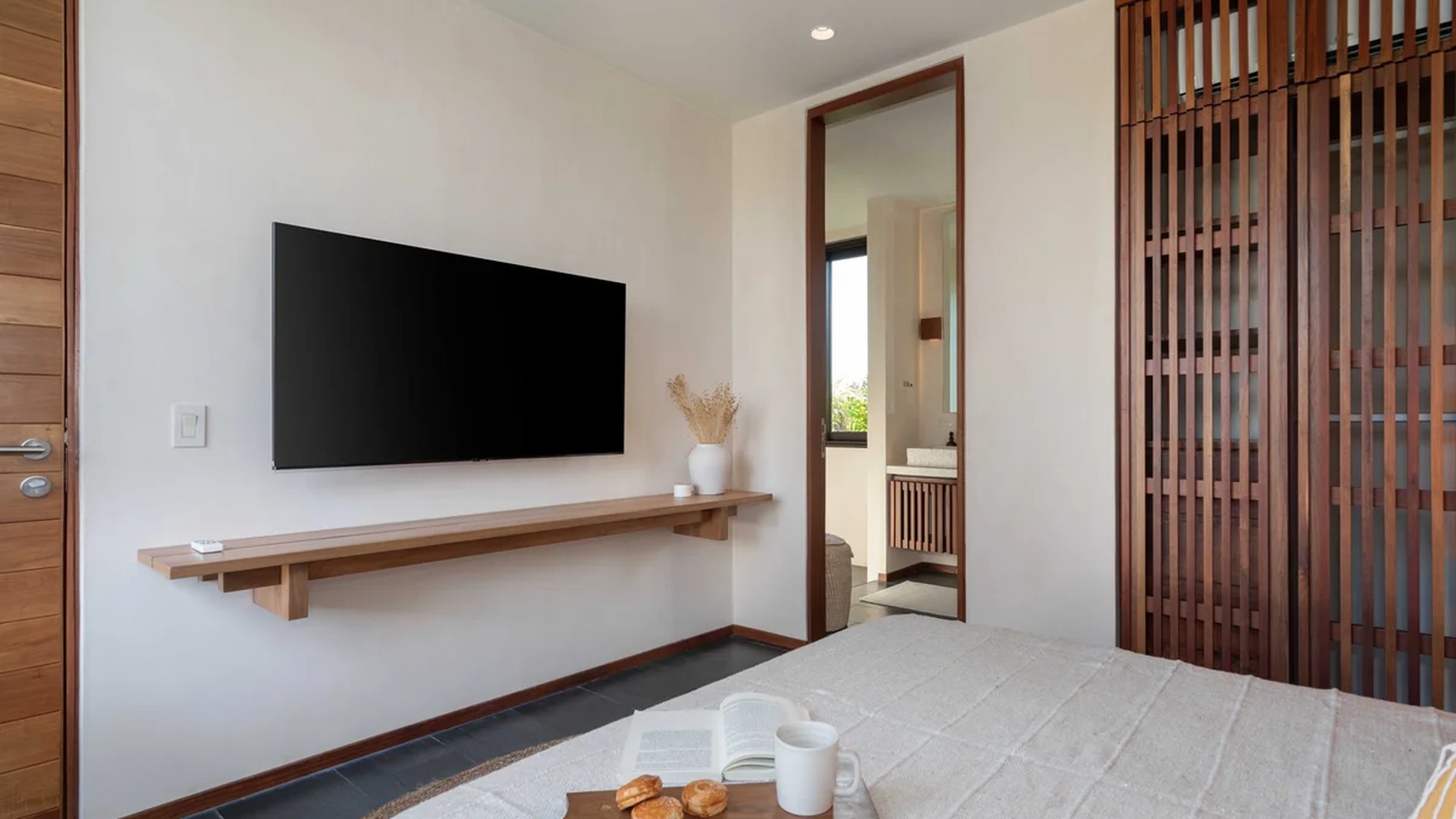 Image of a Bedroom Suite, featuring En-suite Bathroom and Natural Wood Finishes.
