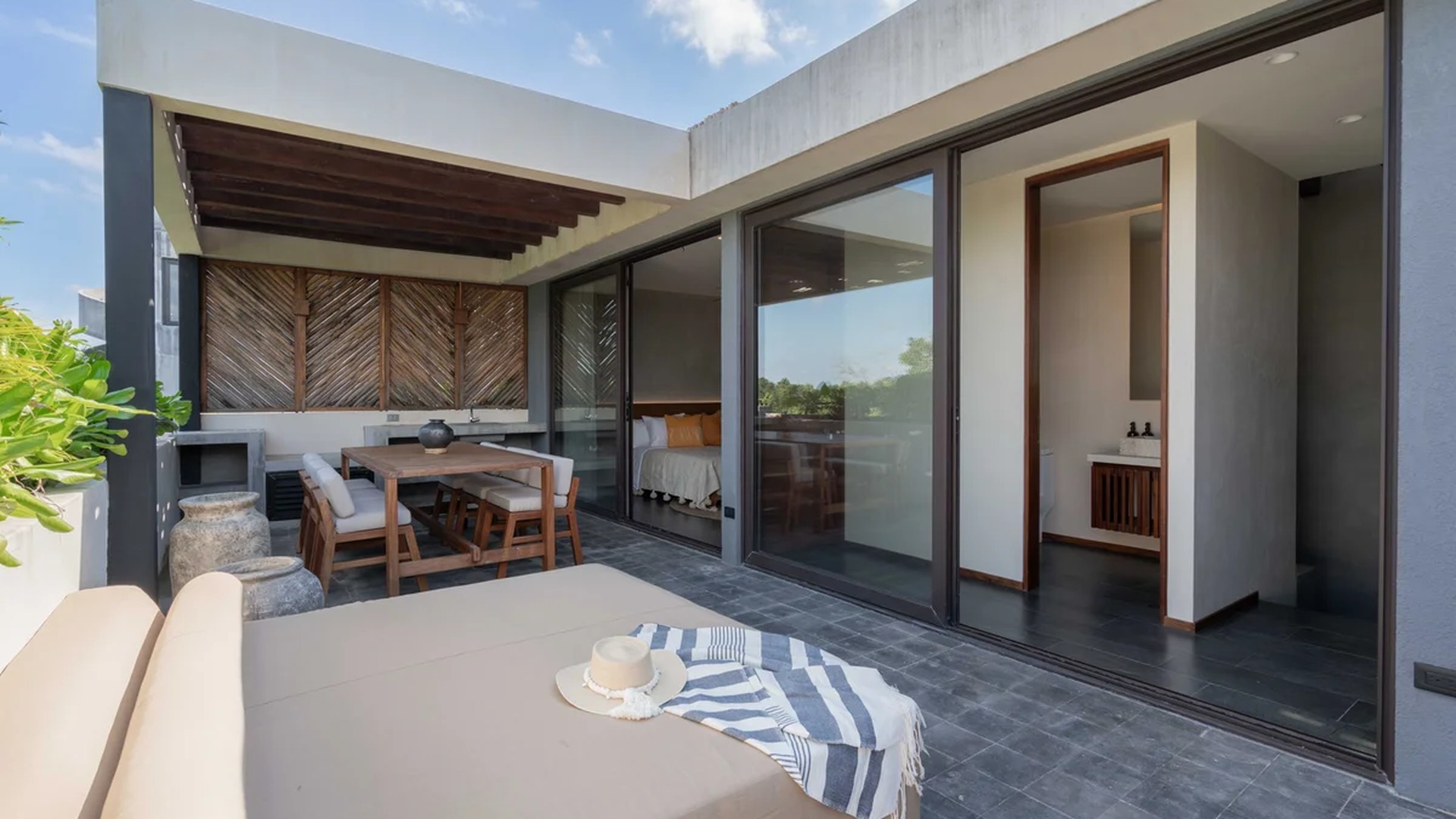Image of a Private Terrace, featuring Outdoor Dining Area and Daybed Lounge.