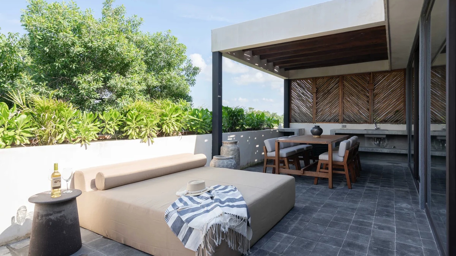 Image of a Rooftop Terrace, featuring Outdoor Dining Area and Sundeck with Daybed.