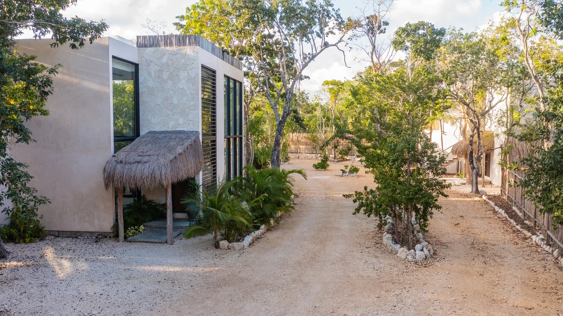 Image of a Modern Jungle Villa, featuring Stone Facade and Contemporary Design.