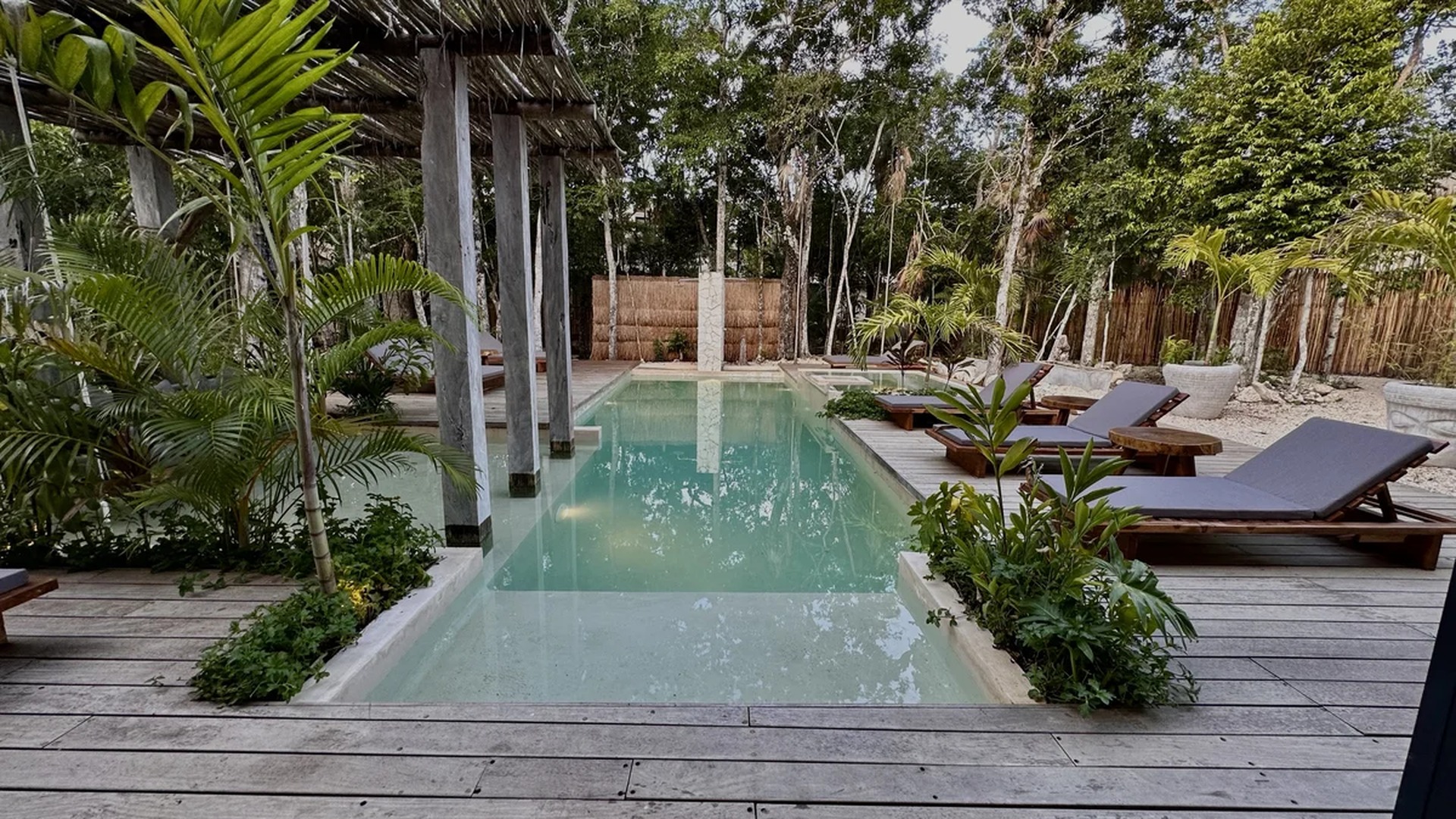 Image of a Private Pool, featuring Wooden Sundeck and Tropical Oasis.
