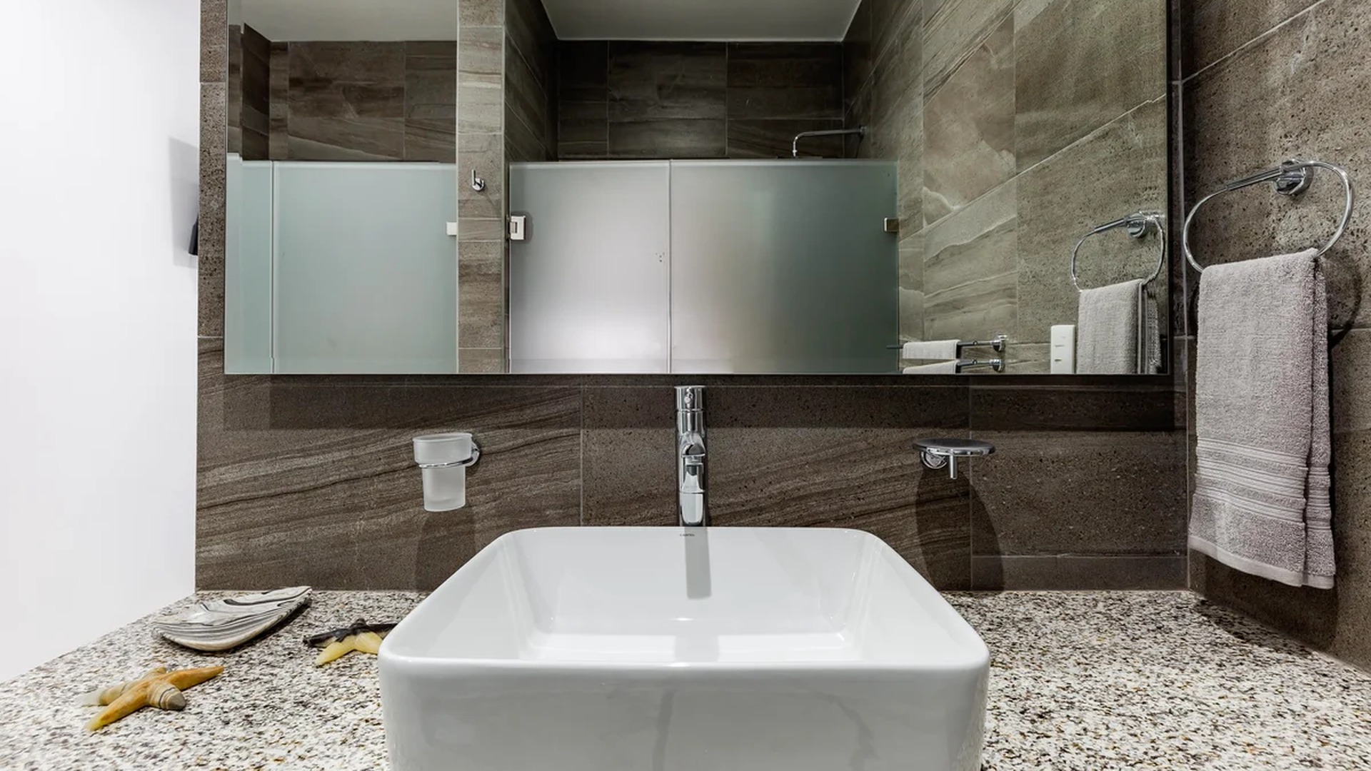 Image of a Modern Bathroom, featuring Vessel Sink and Granite Countertop.