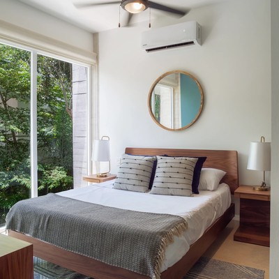 Image of a Modern Bedroom, featuring Garden View and Sliding Glass Doors.