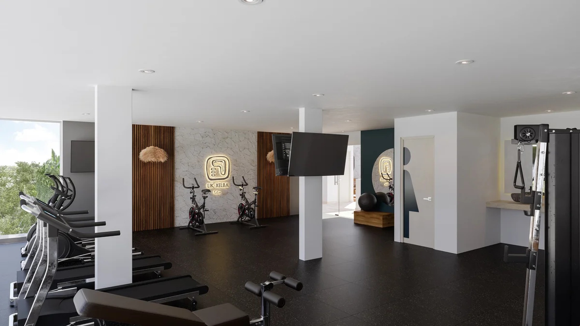 Image of a Fitness Center, featuring Modern Gym Equipment and Stone Accent Wall.