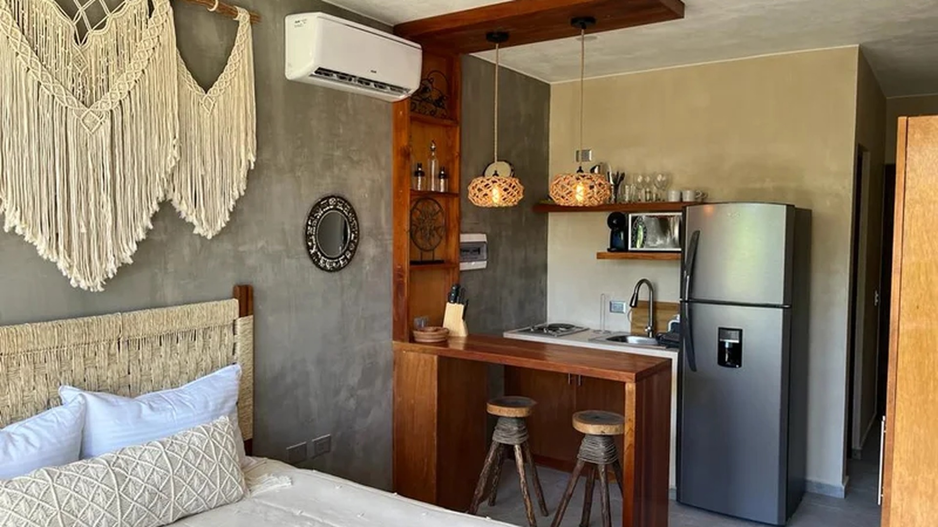 Image of a Studio Apartment, featuring Kitchenette and Bohemian Decor.