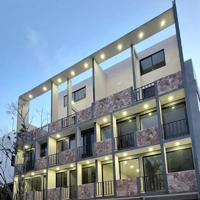 Image of a Modern Architecture, featuring Private Balconies and Natural Stone Facade.