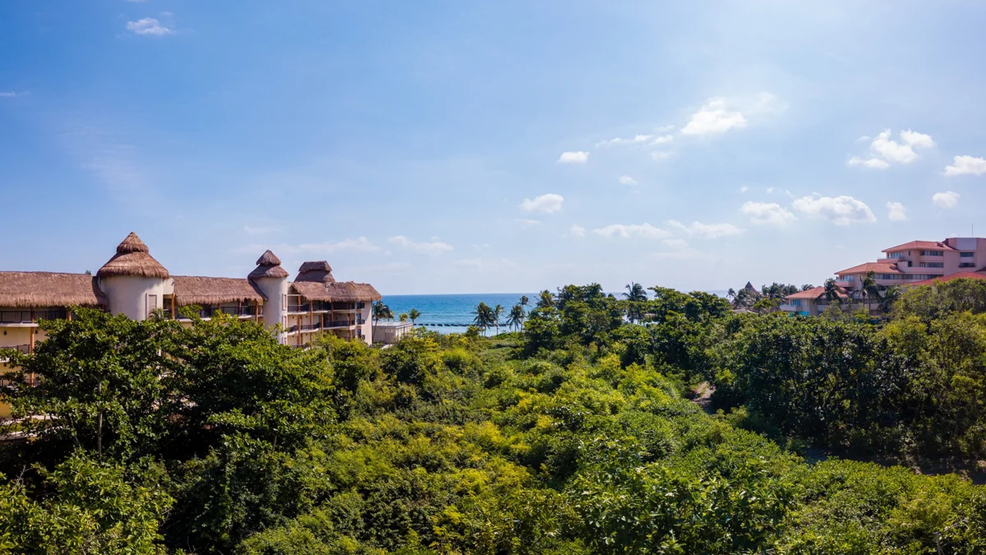 Image of a Ocean View, featuring Beachfront Resort and Tropical Architecture.