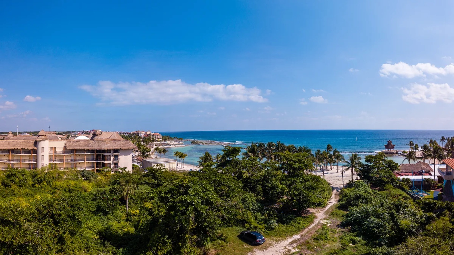 Image of a Ocean View, featuring Beachfront Resort and Tropical Scenery.