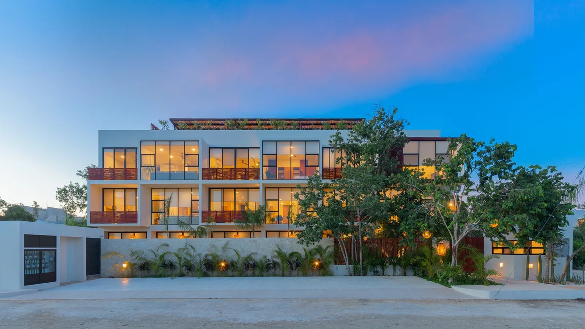 Image of a Modern Apartment Building, featuring Contemporary Design and Floor-to-Ceiling Windows.