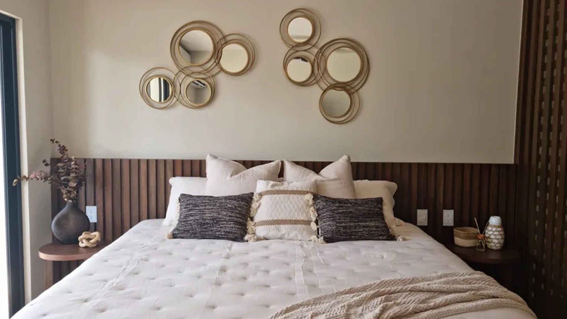 Image of a Primary Bedroom, featuring Wood Slat Accent Wall and King Size Bed.