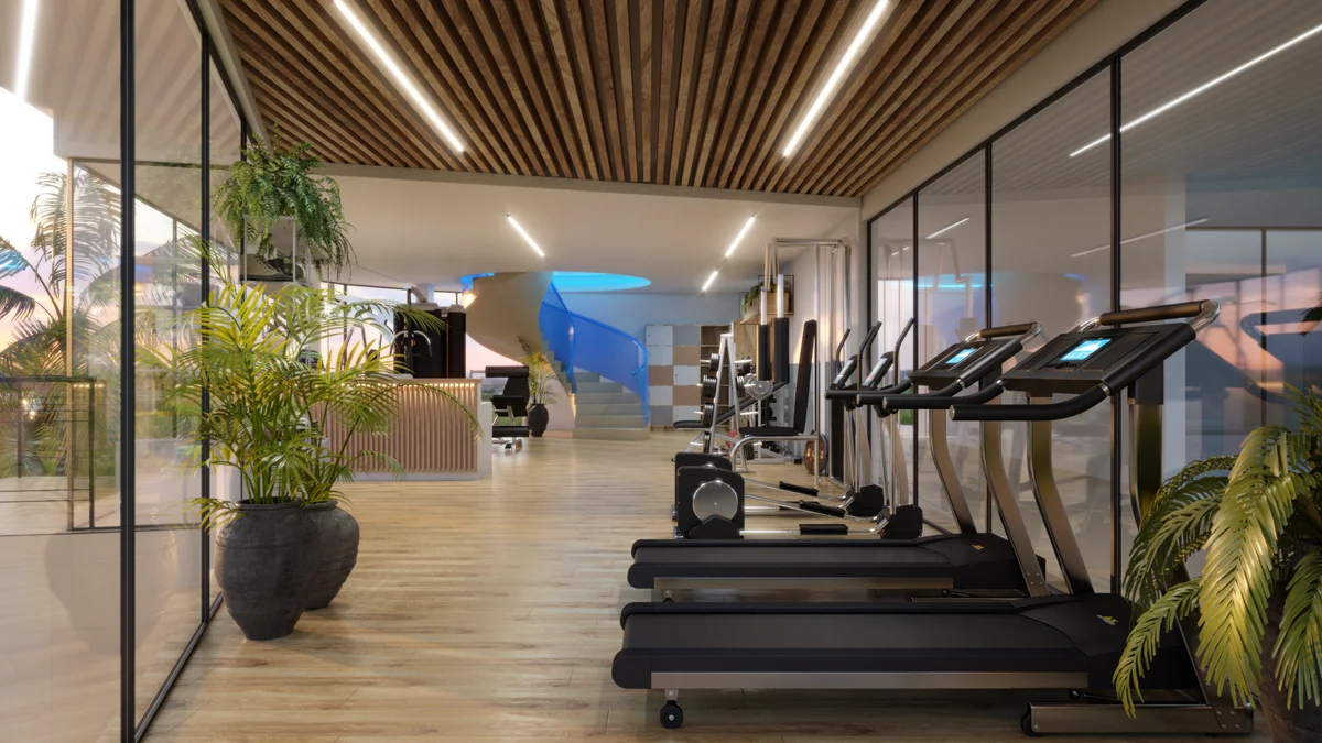 Image of a Fitness Center, featuring State-of-the-Art Equipment and Floor-to-ceiling Windows.