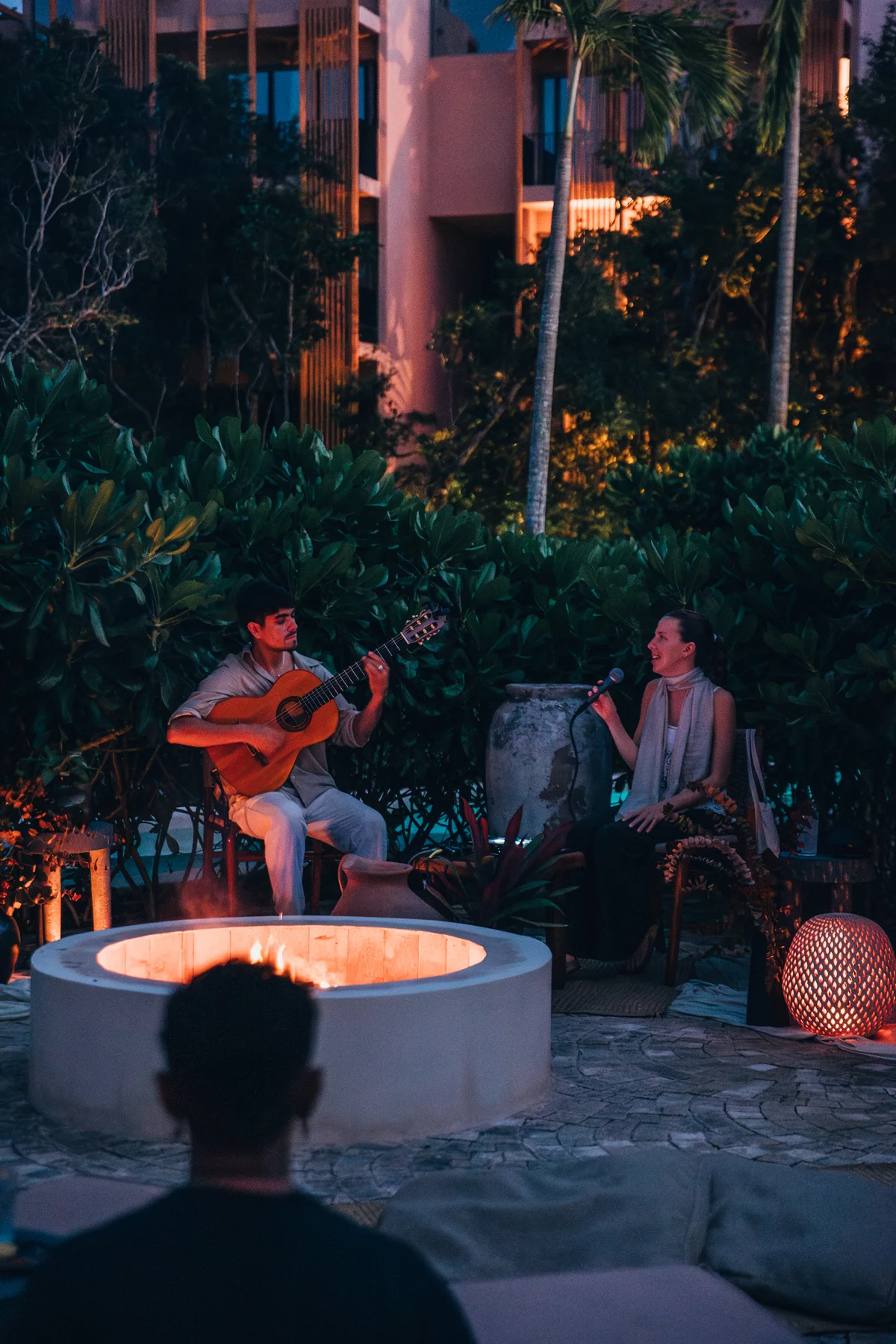 Image of a Outdoor Lounge, featuring Fire Pit Terrace and Modern Architecture.