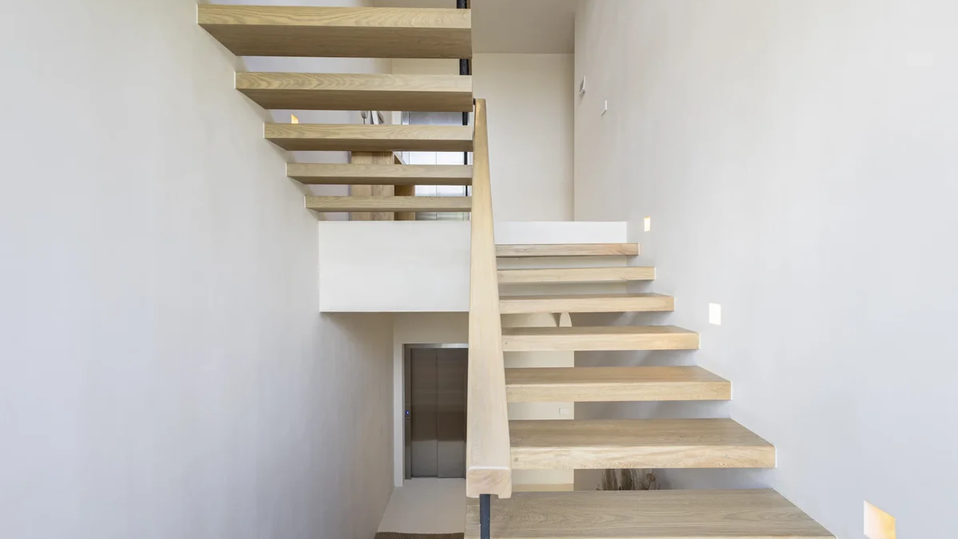 Image of a Floating Staircase, featuring Modern Staircase and Light Oak Treads.