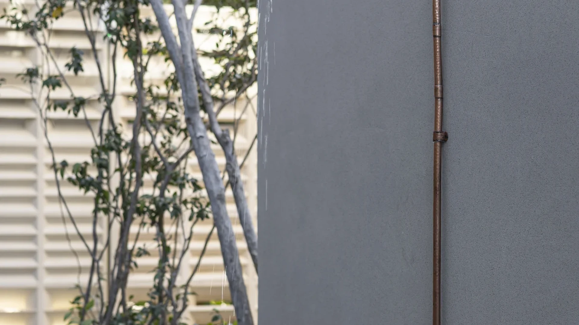 Image of a Outdoor Shower, featuring Garden Oasis and Hammered Copper Fixtures.