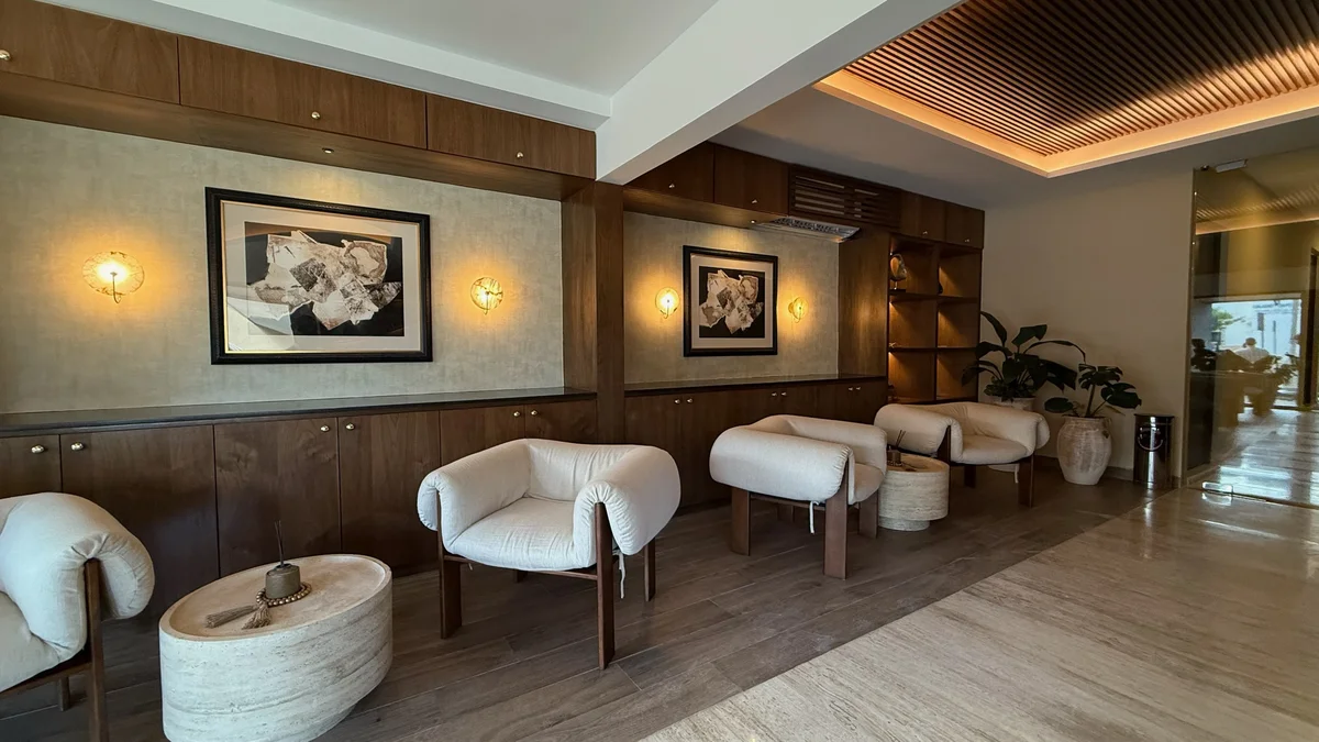 Image of a Lobby Lounge, featuring Modern Design and Wood Paneling.