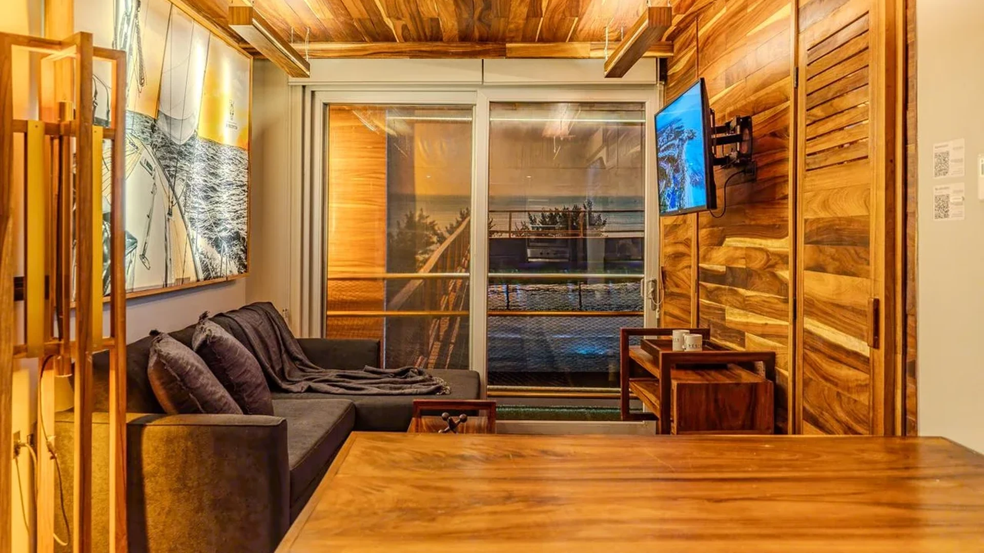 Image of a Living Area, featuring Wood Paneling and Hardwood Ceiling.