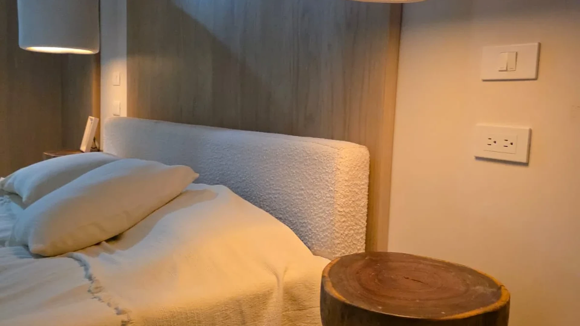 Image of a Bedroom, featuring Organic Modern Design and Wood Accent Wall.