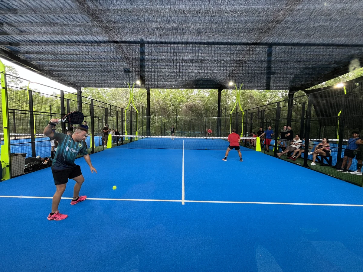 Image of a Padel Court, featuring Sports Court and Covered Recreation Area.