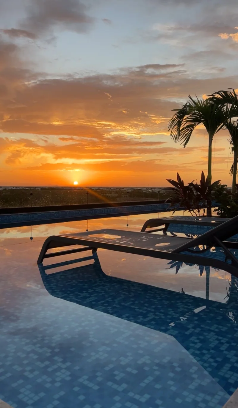 Image of a Infinity Pool, featuring Sunset View and Rooftop Terrace.