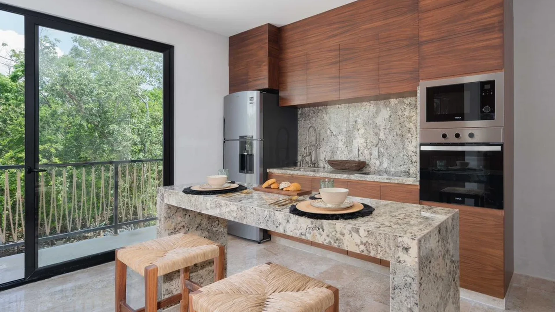 Image of a Modern Kitchen, featuring Granite Countertops and Waterfall Island.