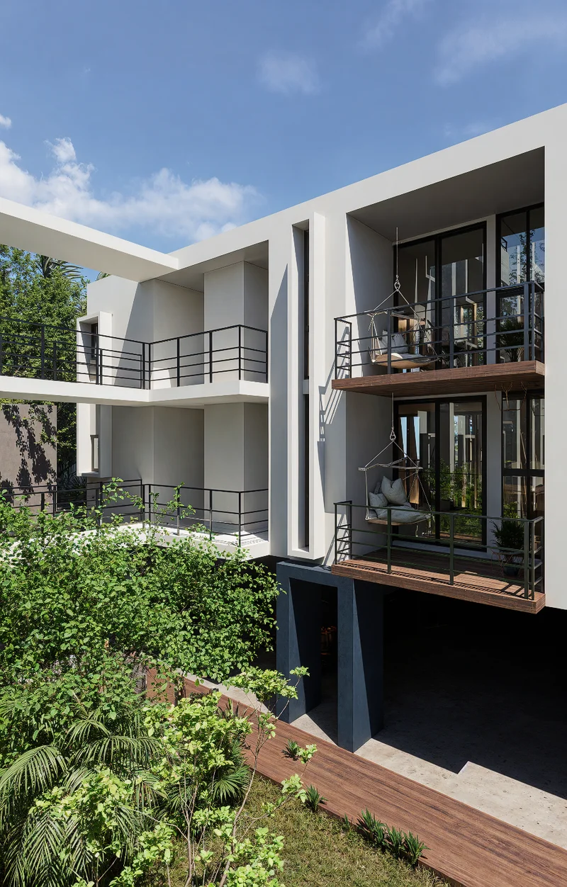 Image of a Modern Architecture, featuring Private Balconies and Lush Courtyard.