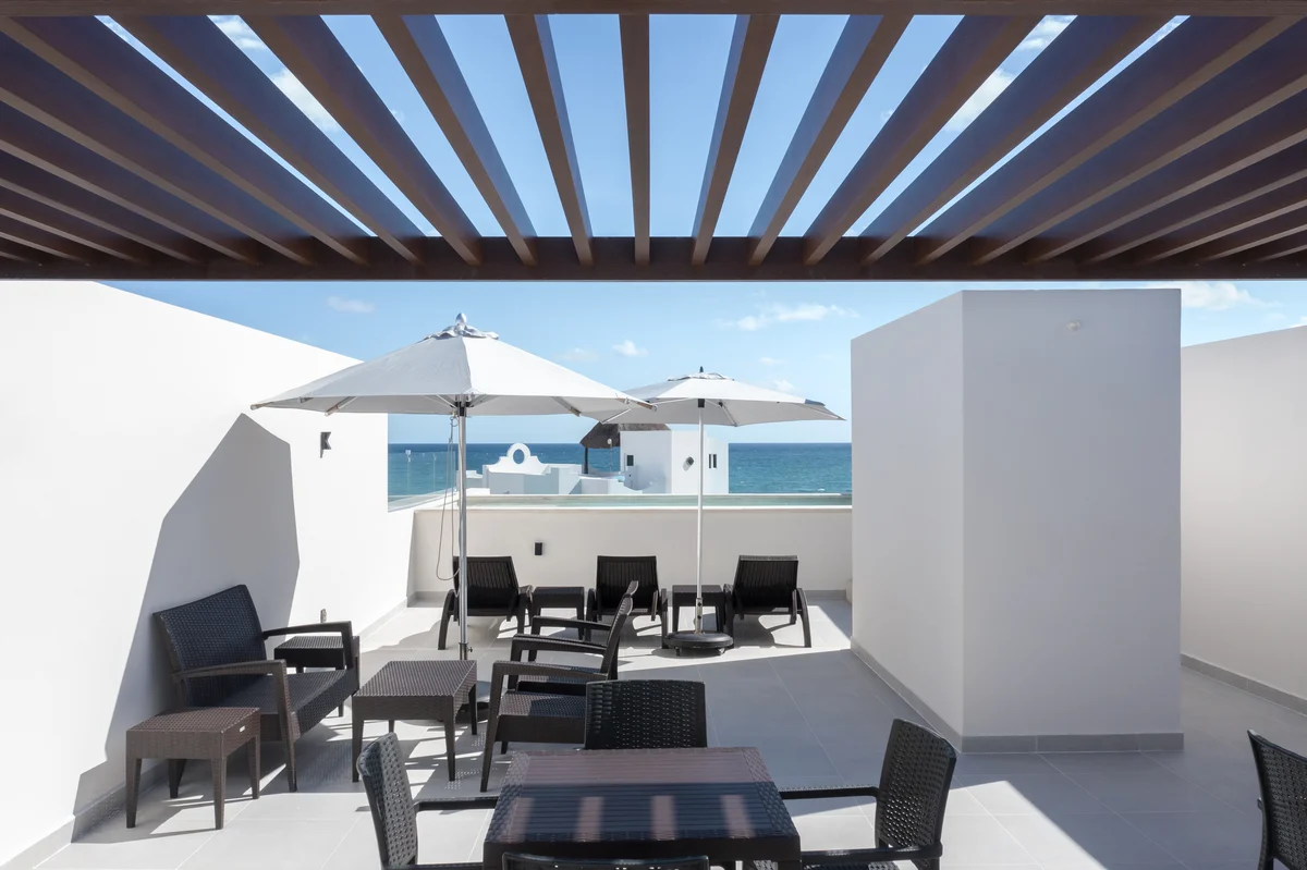 Image of a Rooftop Terrace, featuring Ocean View and Pergola.