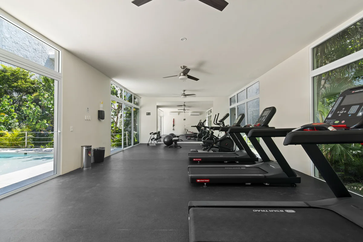 Image of a Fitness Center, featuring Gym and Pool View.