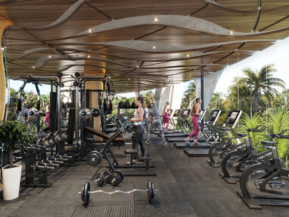 Image of a Fitness Center, featuring State-of-the-Art Gym and Tropical View.