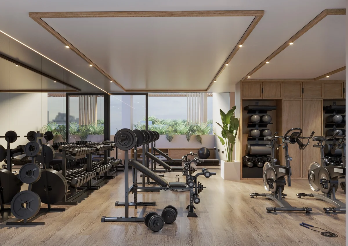 Image of a Fitness Center, featuring Modern Gym and Free Weights Section.