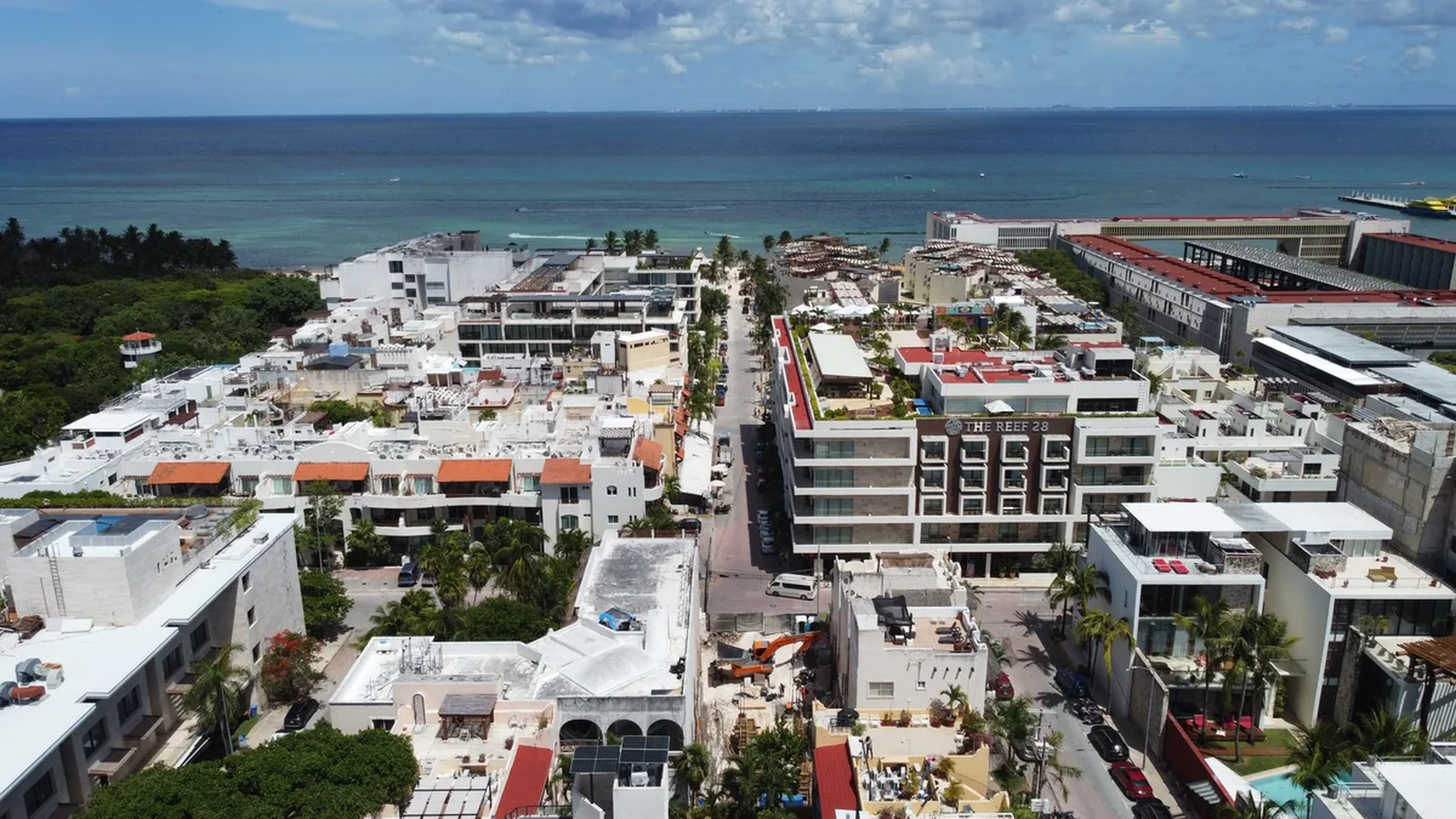 Image of a Aerial View, featuring Ocean View and Beachfront Town.