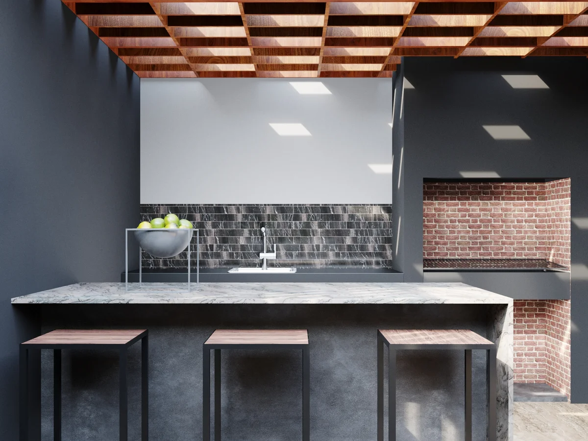 Image of a Outdoor Kitchen, featuring Marble Countertop and Wooden Pergola.