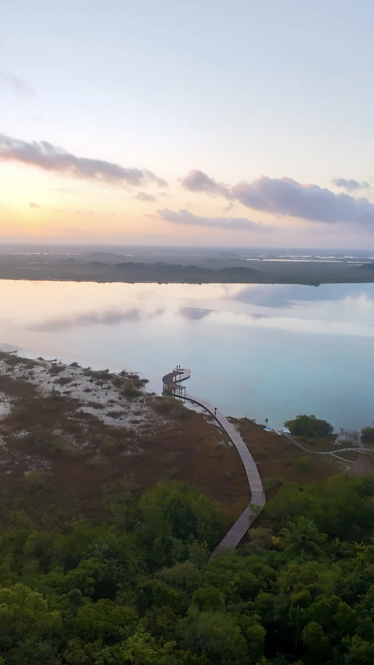 Image of a Lakefront View, featuring Private Dock and Sunrise View.