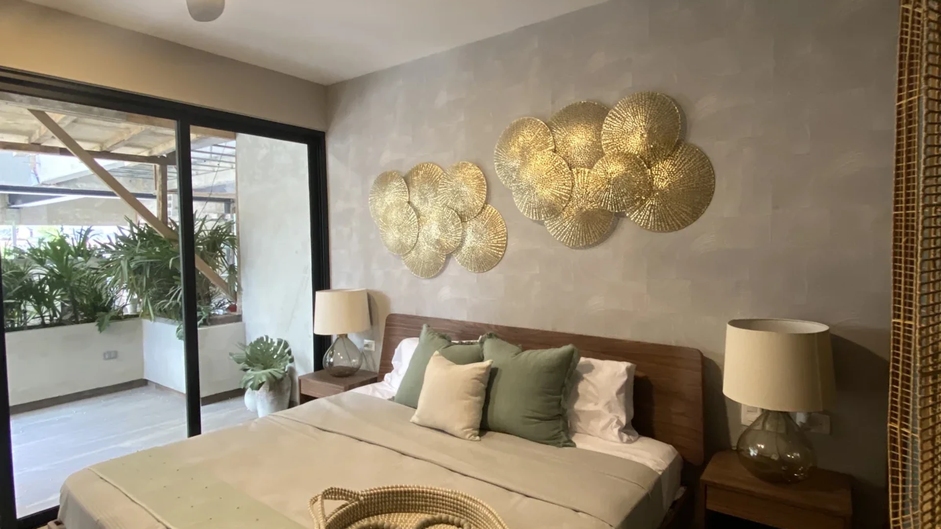 Image of a Primary Bedroom, featuring Private Balcony and Sliding Glass Doors.