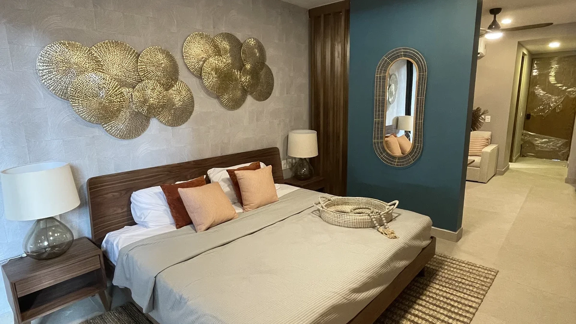 Image of a Modern Bedroom, featuring Teal Accent Wall and Wood Platform Bed.