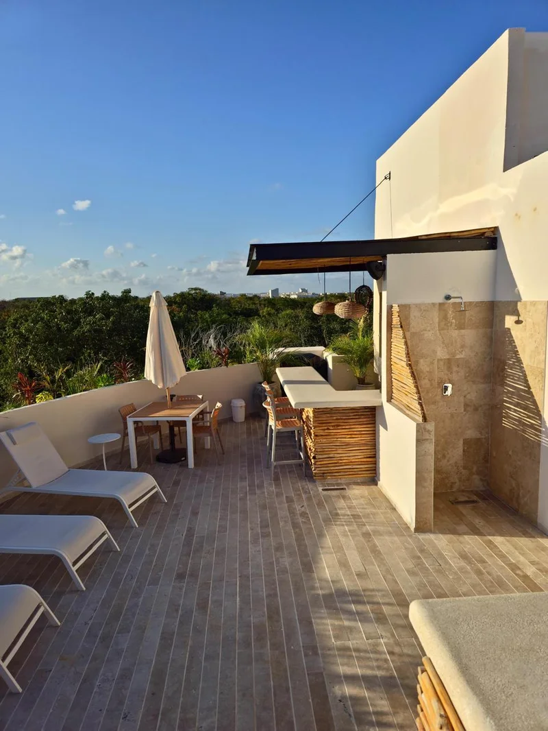 Image of a Rooftop Terrace, featuring Jungle View and Outdoor Bar.