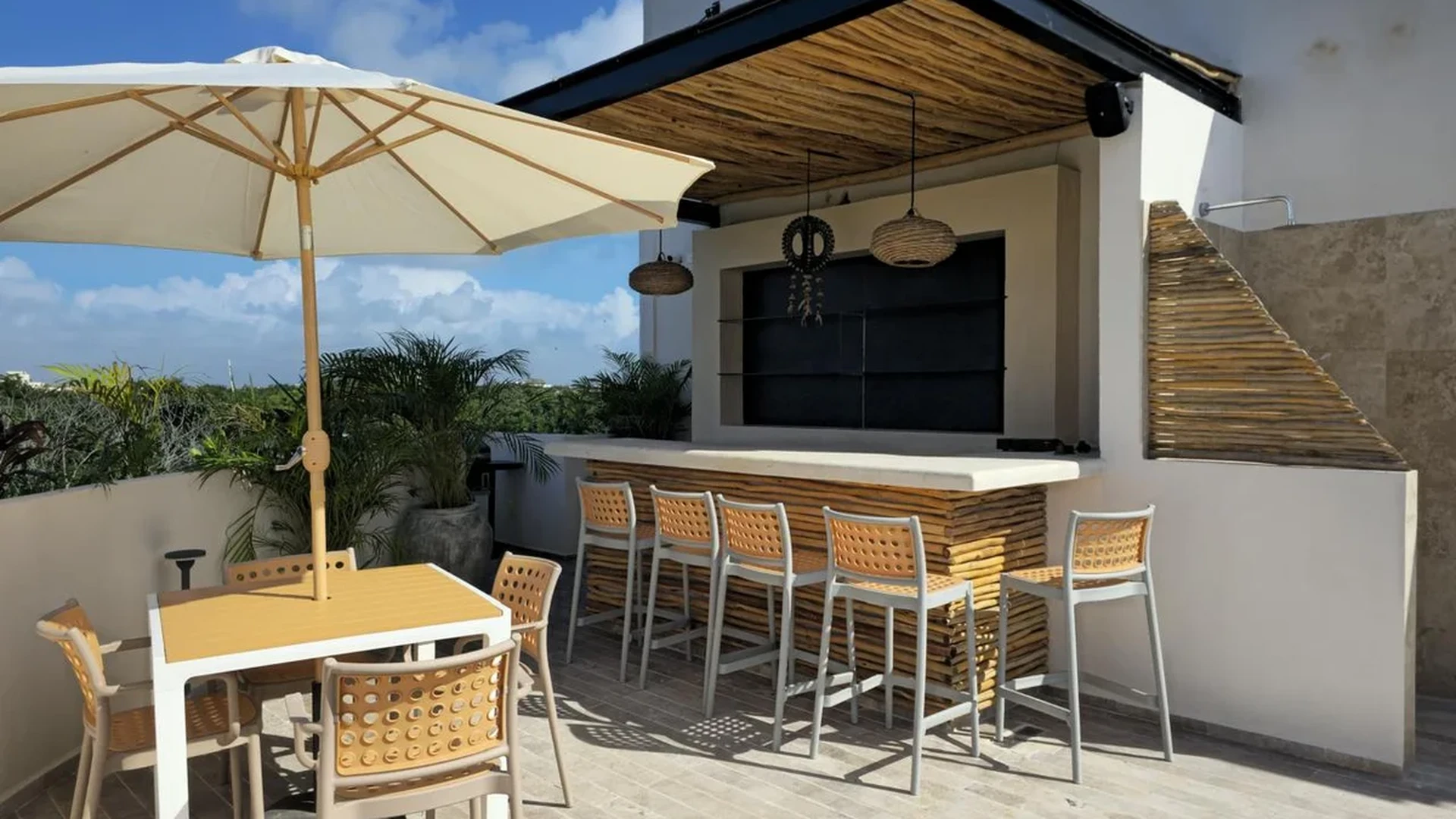 Image of a Rooftop Terrace, featuring Private Outdoor Bar and Al Fresco Dining.