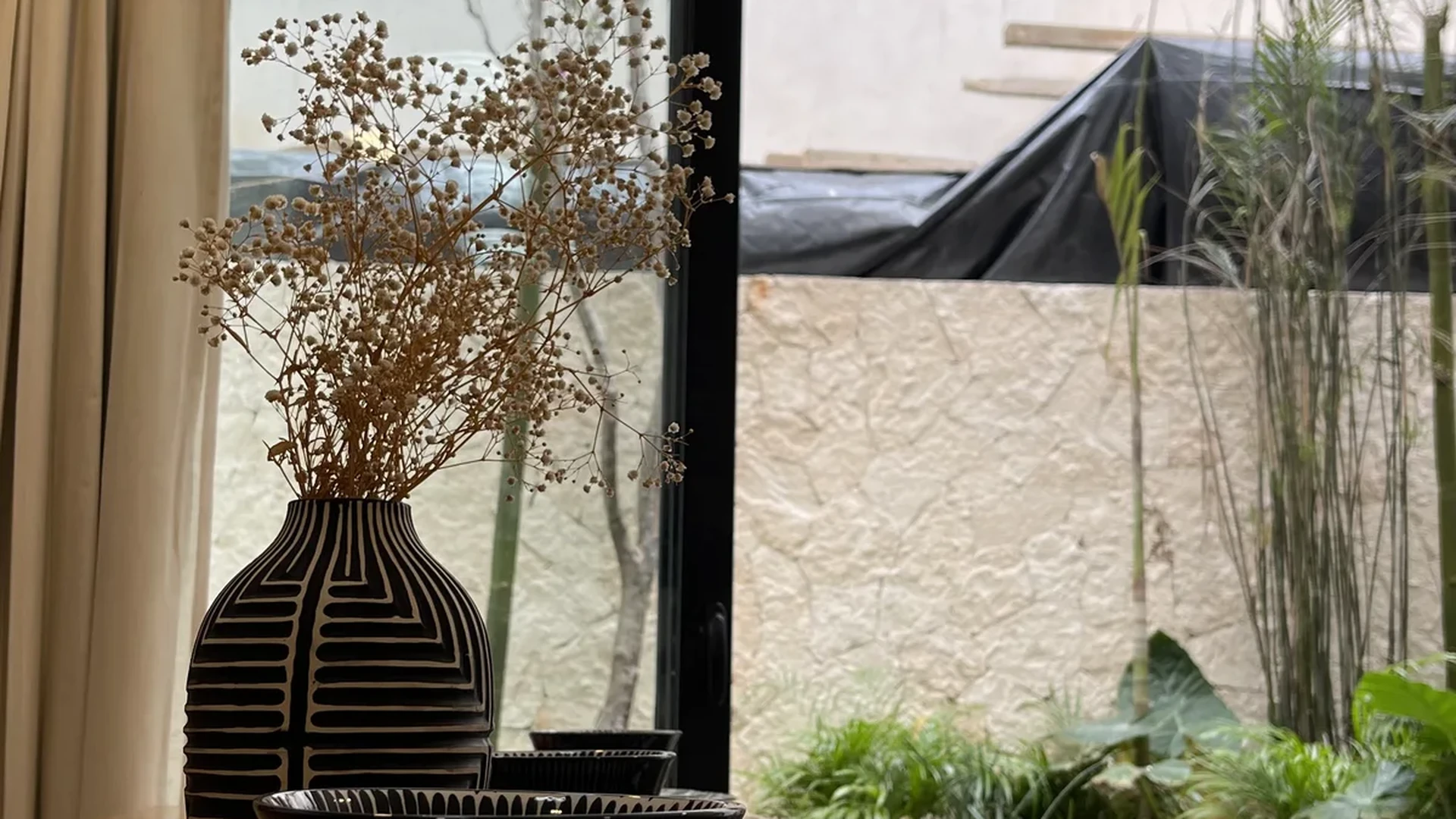 Image of a Dining Area, featuring Wood Dining Table and Modern Decor.