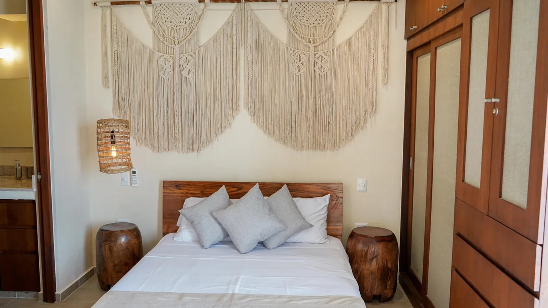 Image of a Bedroom, featuring Bohemian Decor and Macrame Wall Art.