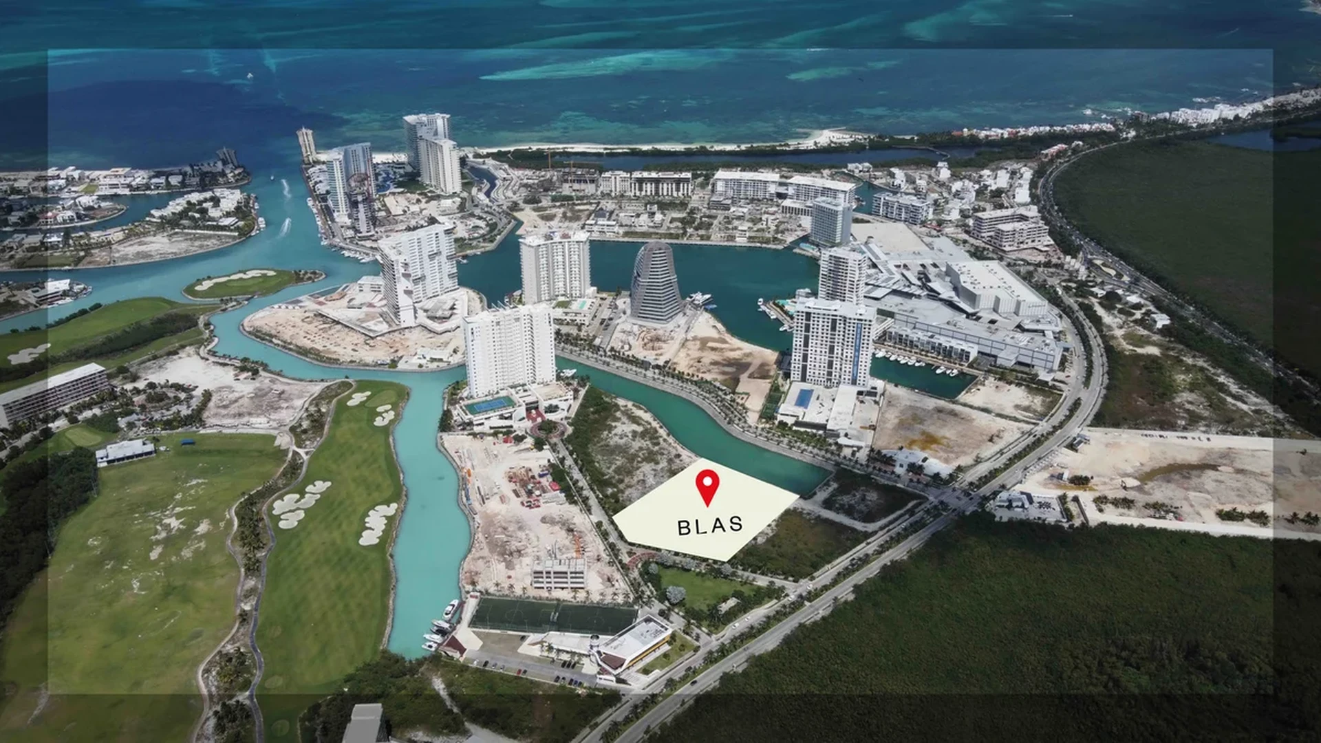 Image of a Aerial View, featuring Waterfront Development and Marina Access.