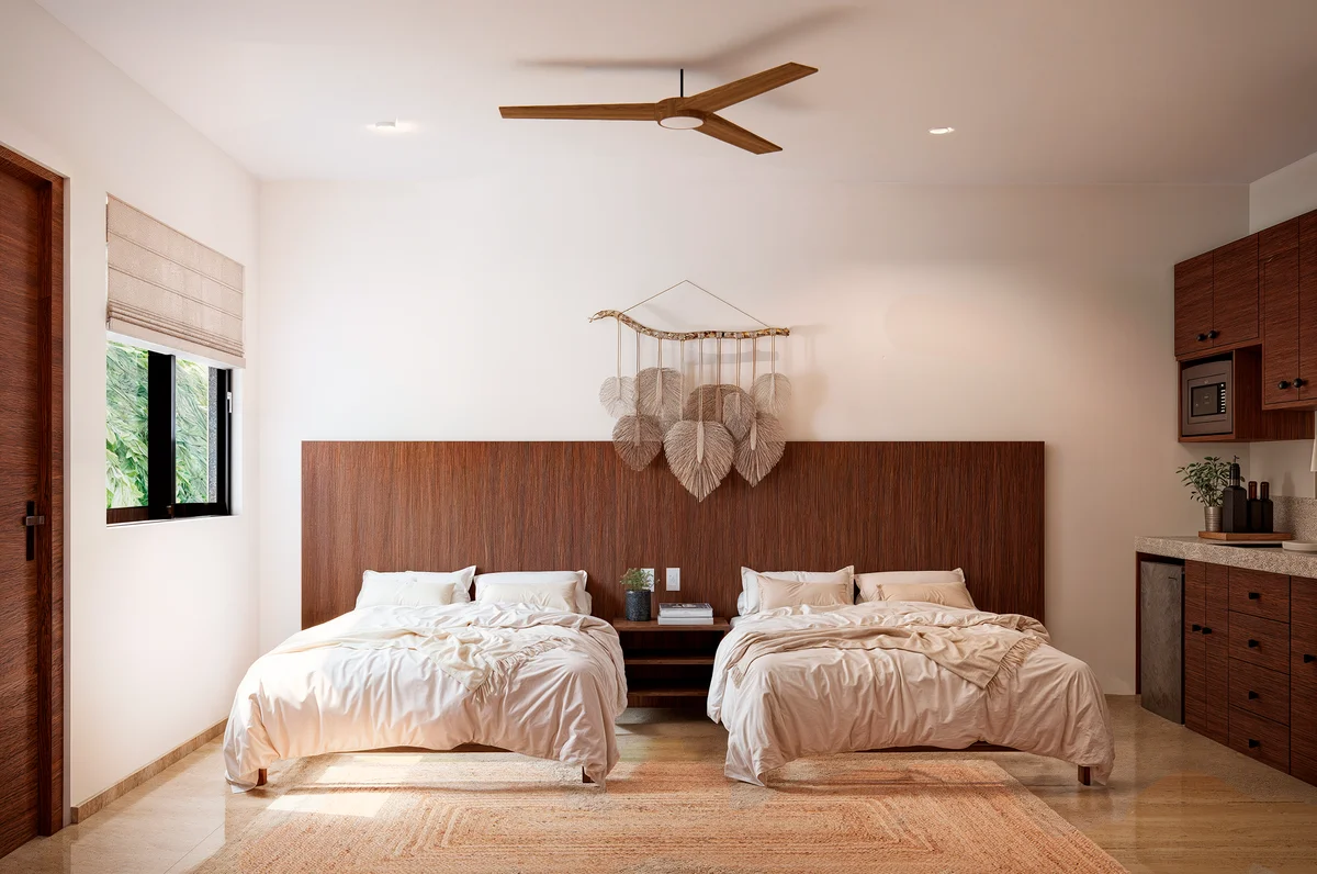 Image of a Double Queen Bedroom, featuring Studio Suite and Kitchenette.