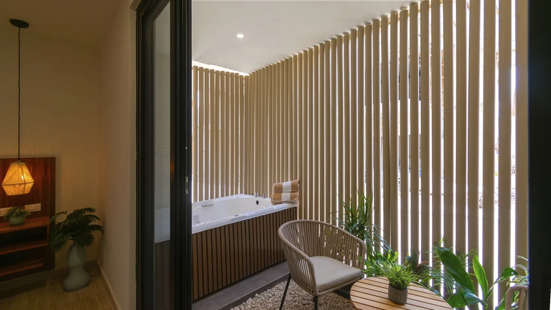 Image of a Private Balcony, featuring Jacuzzi Tub and Indoor-Outdoor Living.