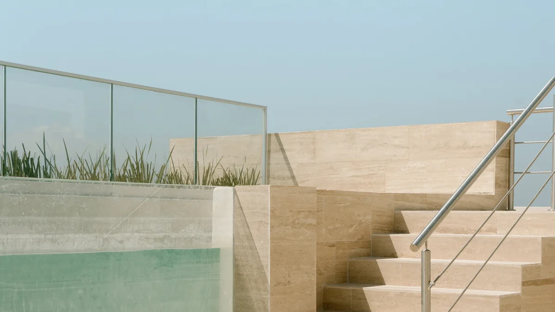 Image of a Rooftop Pool, featuring Sundeck and Travertine Terrace.