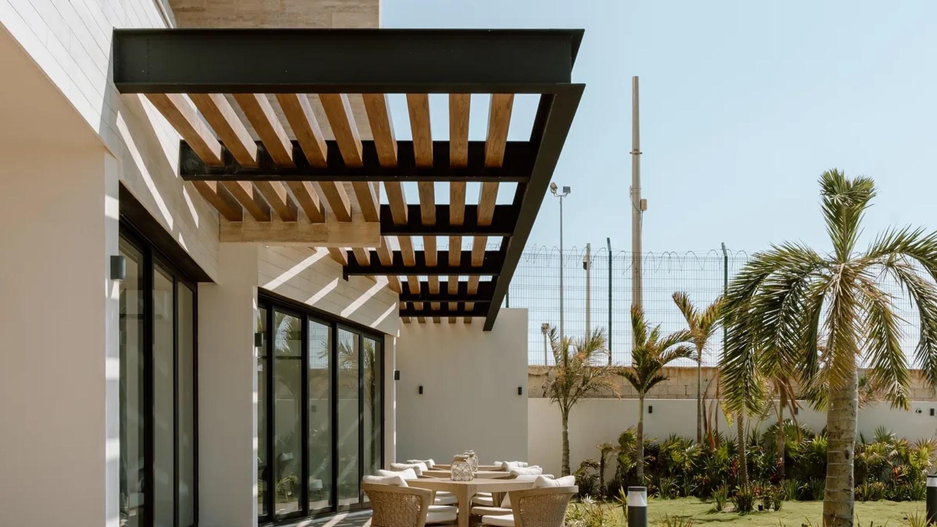 Image of a Outdoor Patio, featuring Covered Pergola and Outdoor Dining Area.