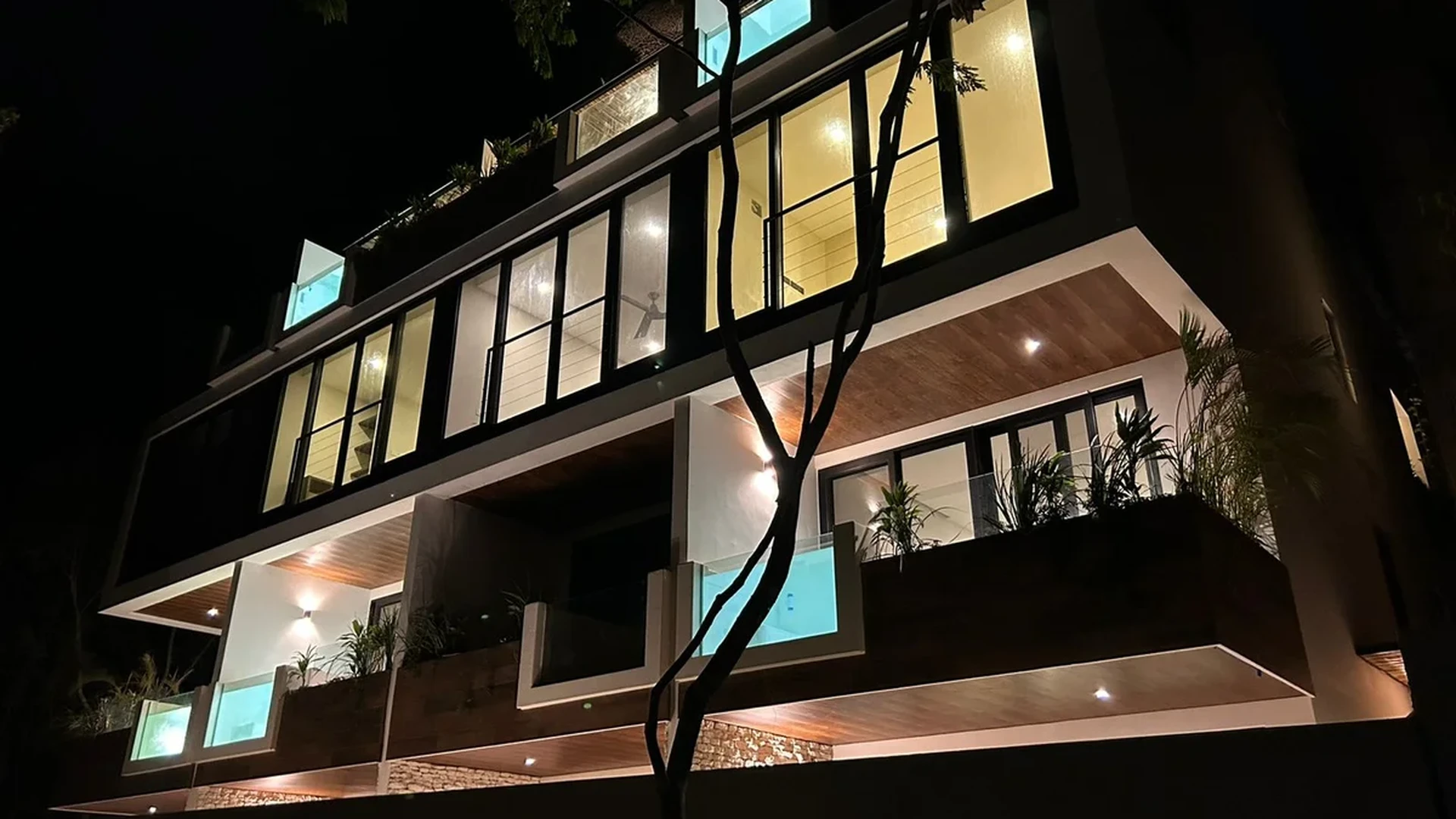 Image of a Modern Condominiums, featuring Private Plunge Pools and Architectural Lighting.