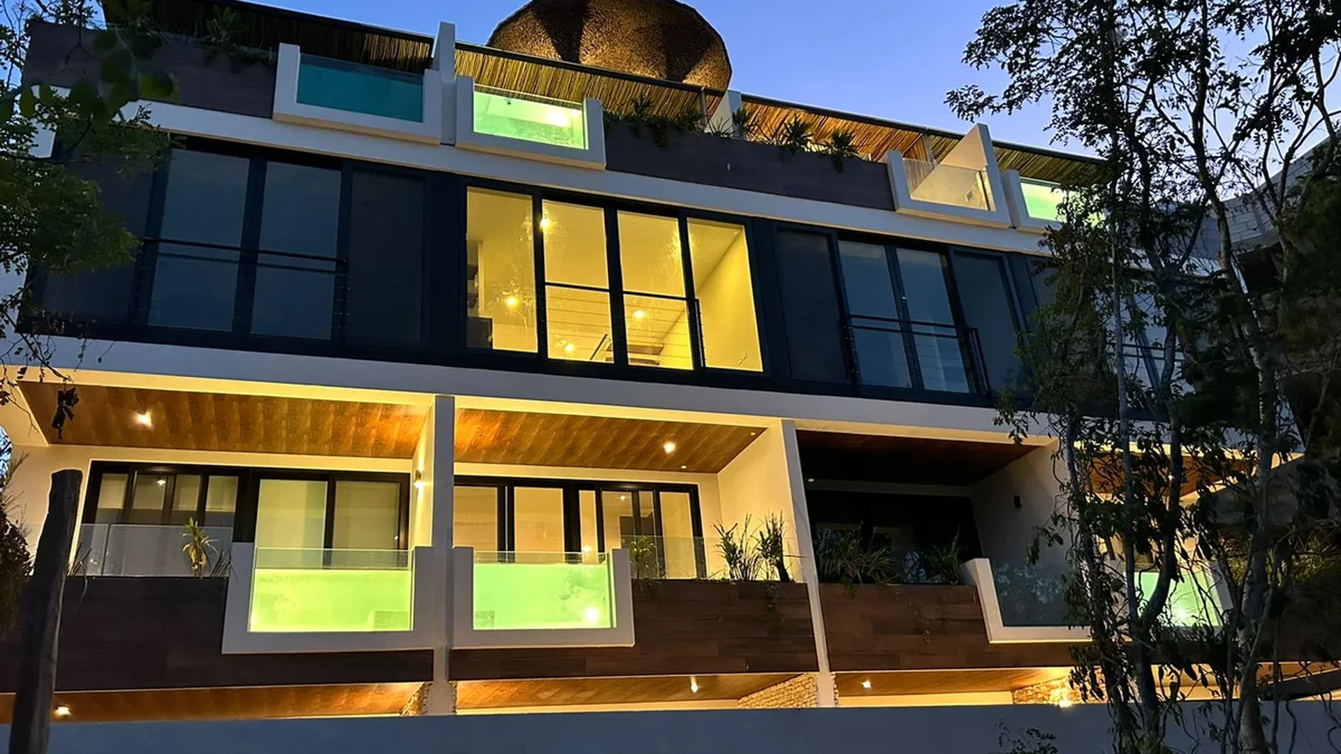 Image of a Modern Architecture, featuring Luxury Villa and Glass-Walled Plunge Pools.