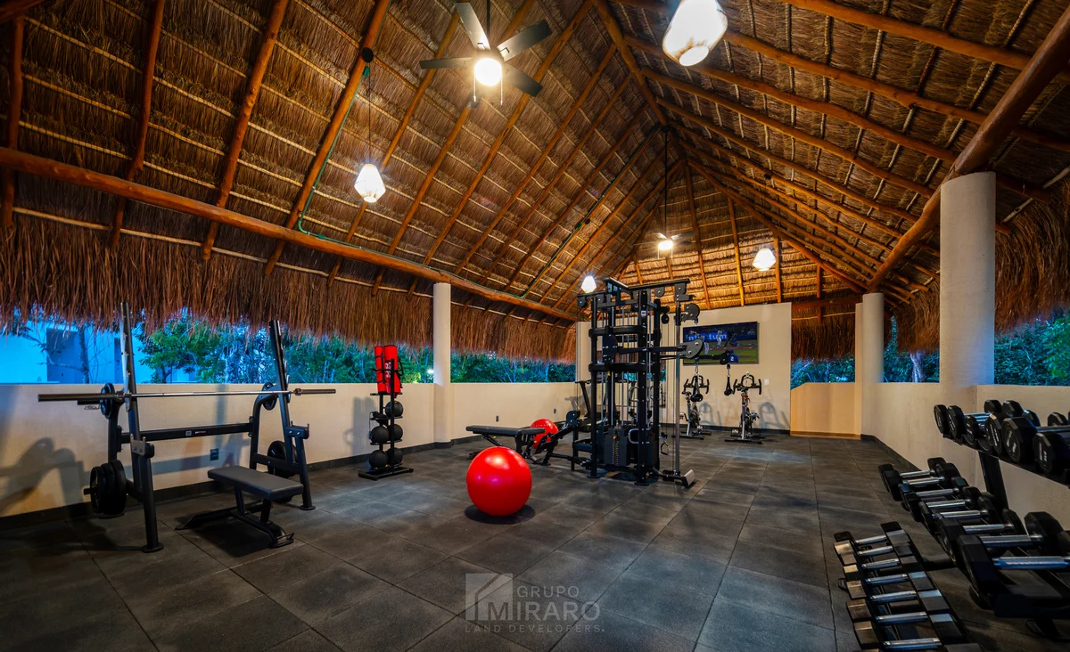 Image of Gym at Selva Escondida II, featuring Fitness Center, Tropical Gym.
