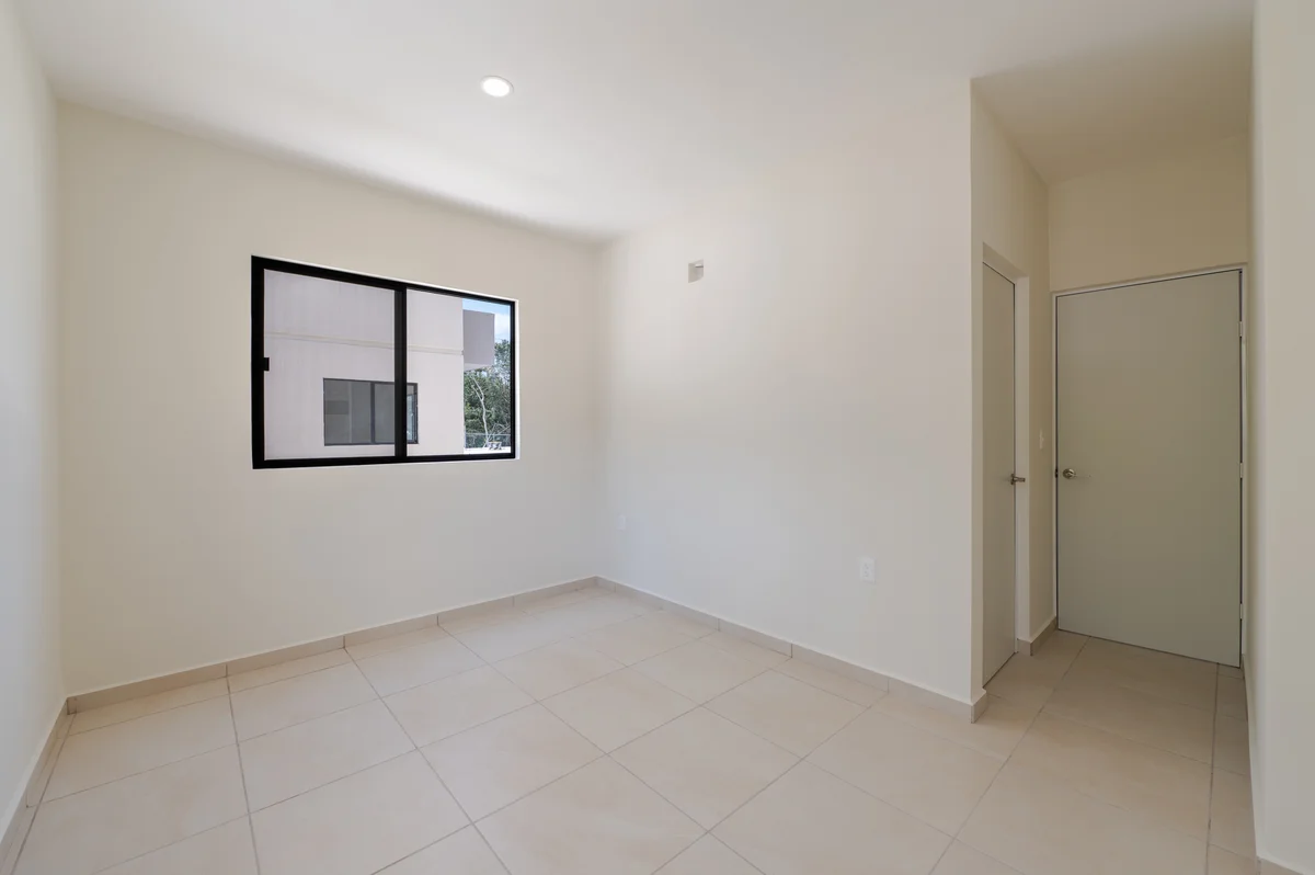 View of Empty Room at Selva Escondida II, showcasing New Construction, Tile Flooring.