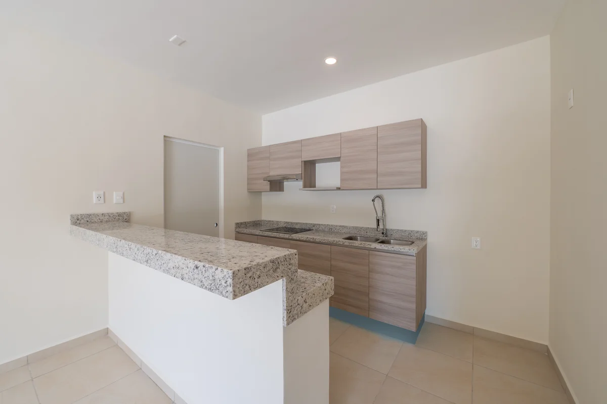 View of Kitchen at Selva Escondida II, showcasing Modern Kitchen, Granite Countertops.